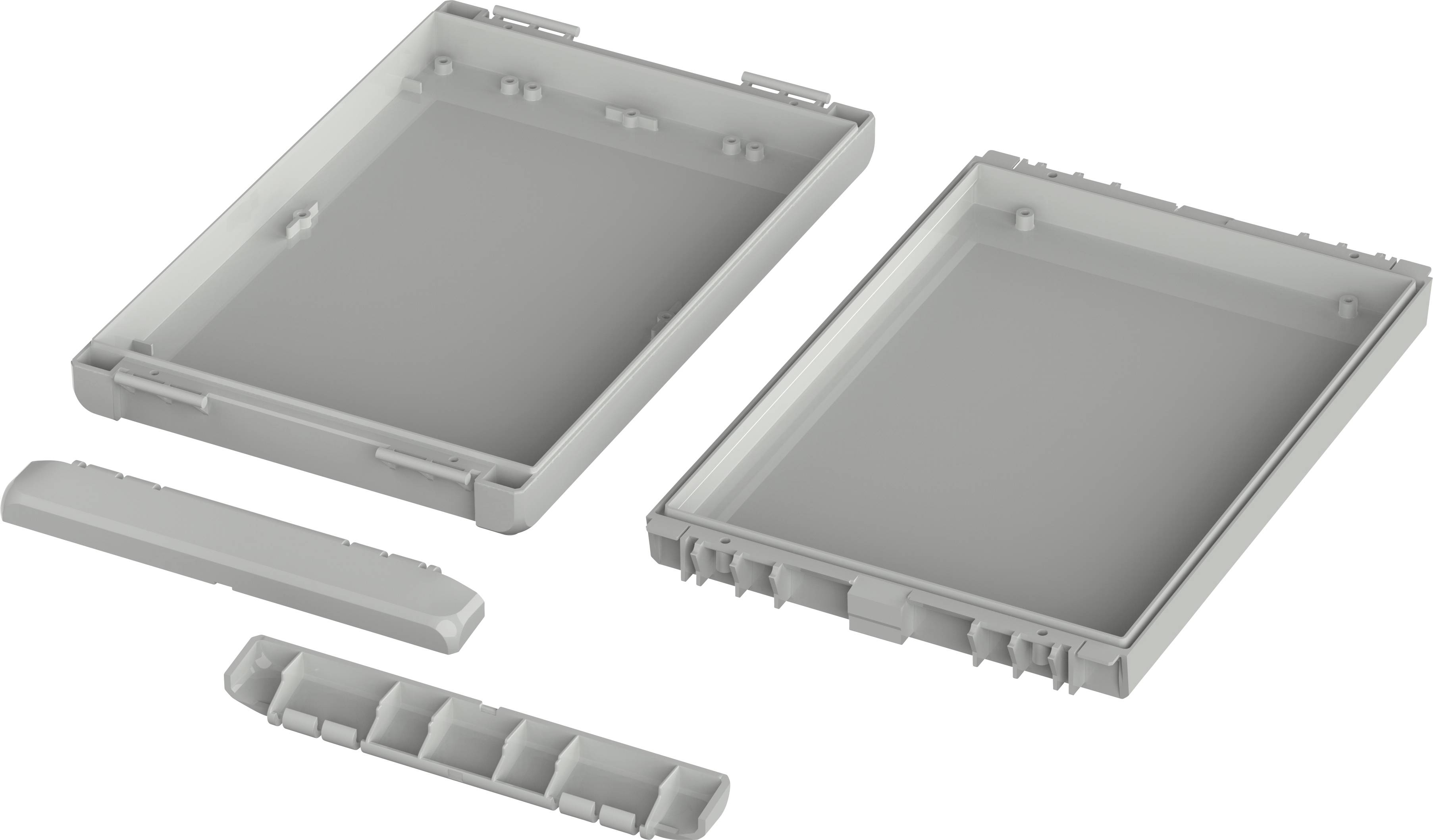 Housing parts for an electronic device, consisting of two halves and two smaller components, shown disassembled.