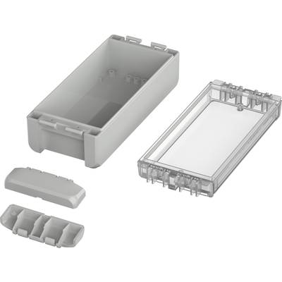 Grey, rectangular plastic casing, opened into four parts: lower housing, transparent lid, battery compartment, and cover.
