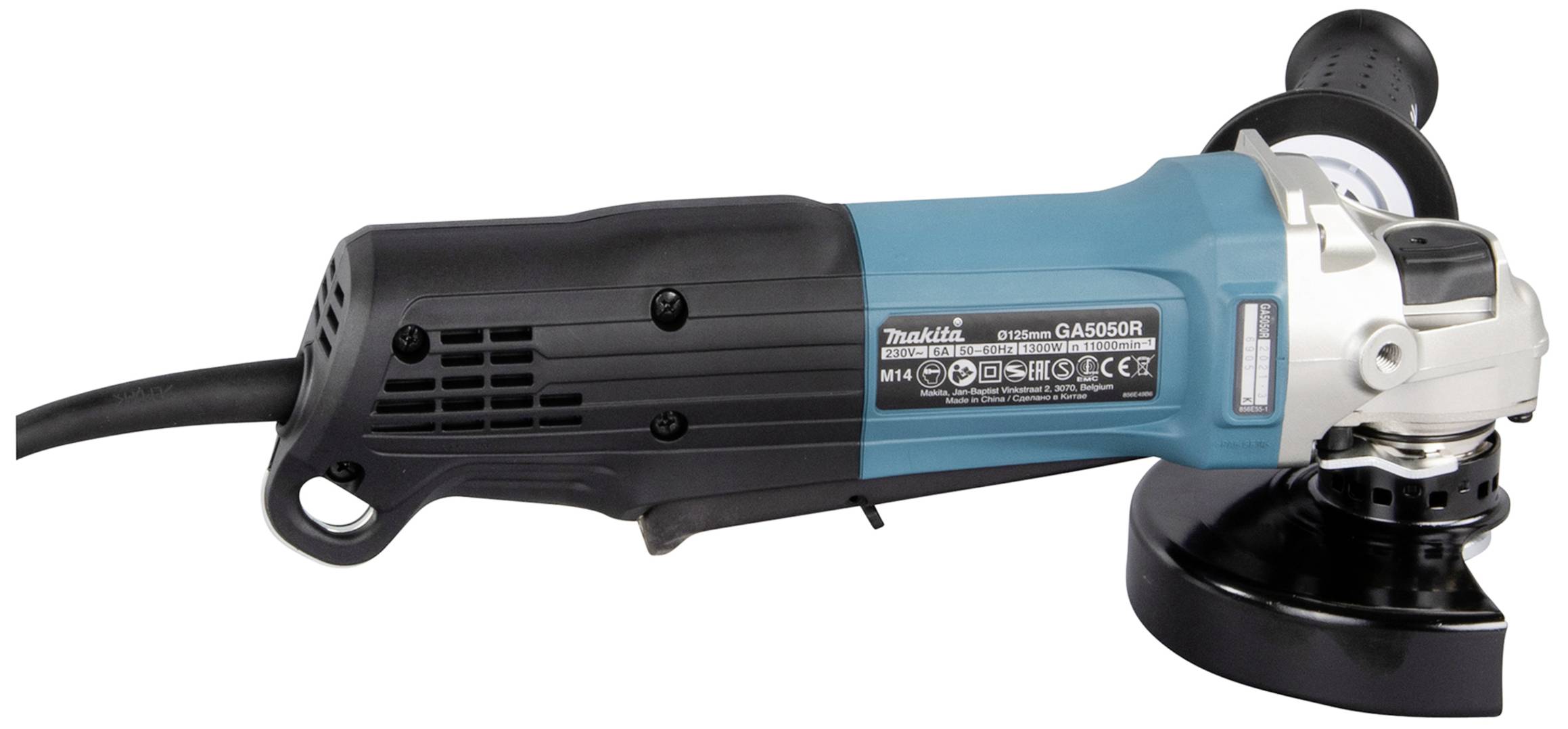 An angle grinder with a blue casing and black handle is lying on its side. The device has several safety and type designations on a label.