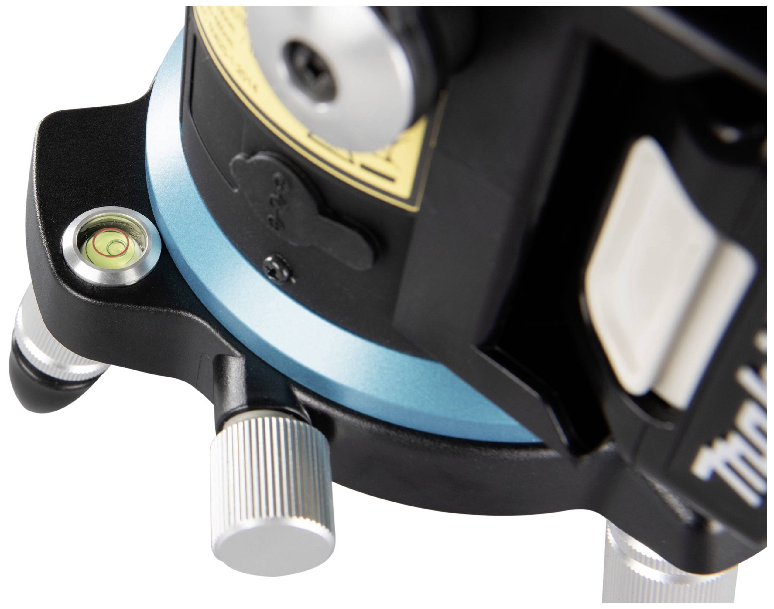 Close-up of a tripod head with a blue base, two silver adjustment knobs, and a spirit level for precise levelling.