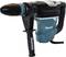 A blue and black electric drill hammer with handle. Branded 'Makita'. Suitable for construction work or renovations.