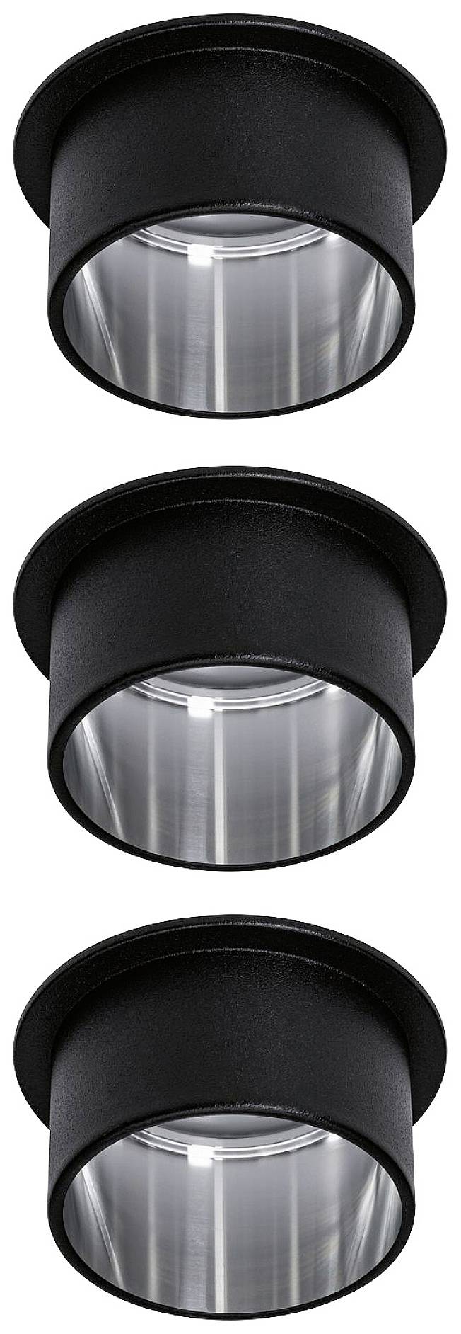 Three black, cylindrical ceiling lights in a vertical arrangement.