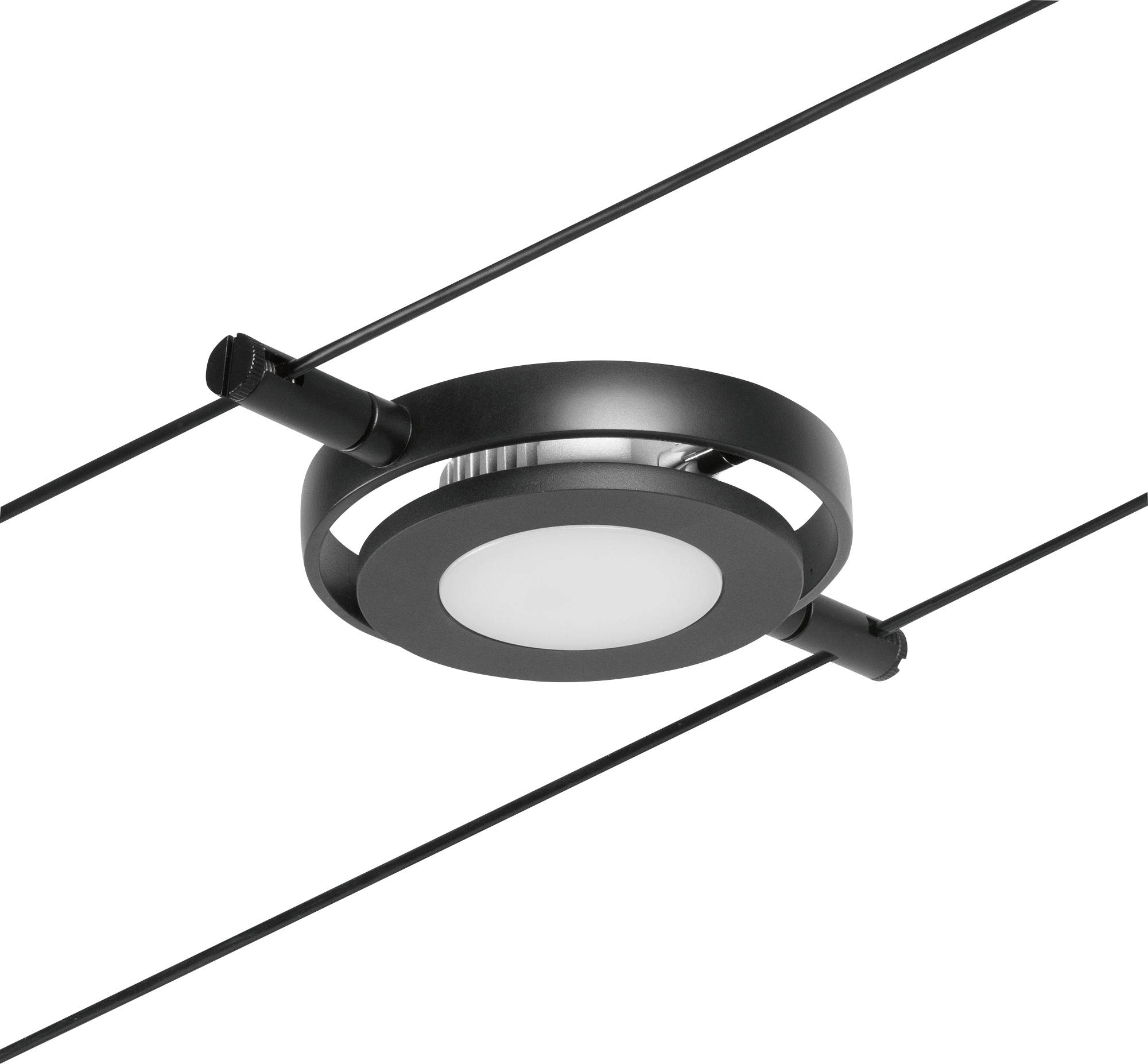 A round, black pendant light is suspended between two cables. It has a modern design and emits a white light.
