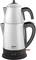 Silver electric kettle with a black handle and spout, Arzum brand, sits on a black base unit.