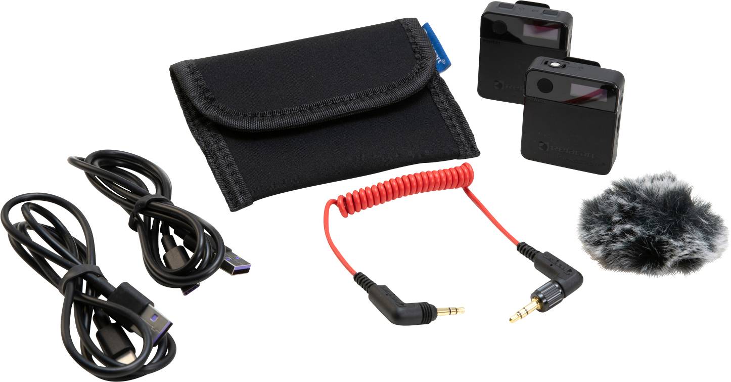 Wireless Microphone Kit with two transmitters, one receiver, black and red audio cables, fur windshield, and a black carry case.
