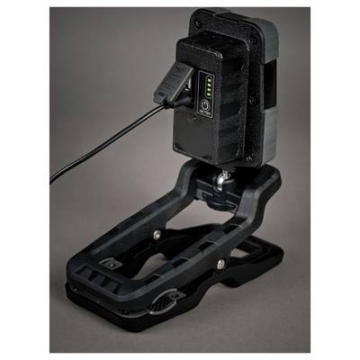 Black rechargeable device on an adjustable mounting base, with a visible USB cable, power button, and battery level indicator lights.