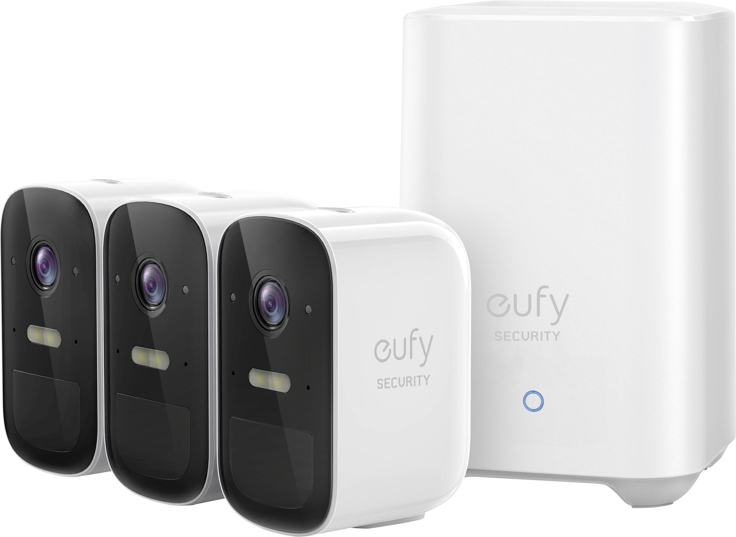 Three white security cameras next to a base station, all bearing the 'eufy Security' logo, for home surveillance.