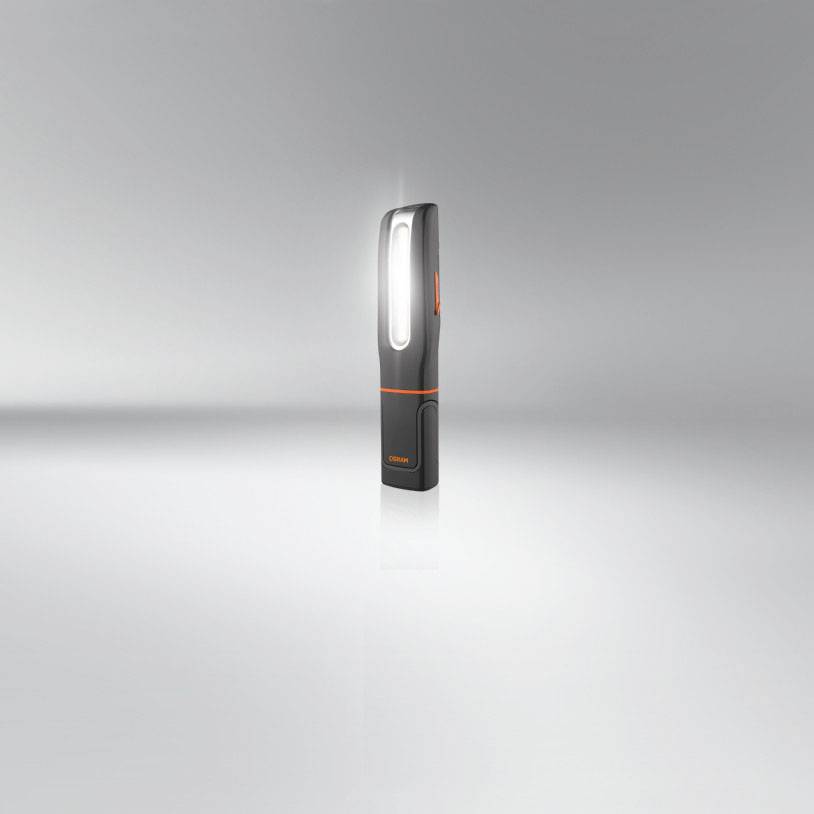 Torch on a grey background, standing with brightly illuminating LED light, modern and sleek design, suitable for portable lighting.