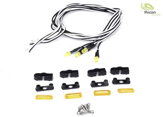 LED light set with cables, black mounting brackets and small screws, suitable for model-making projects.
