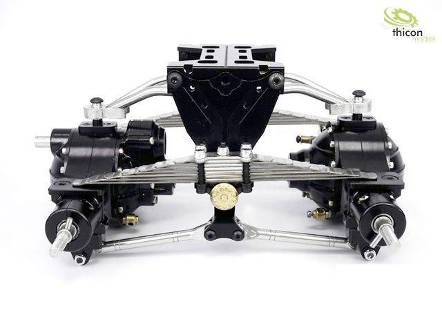 Image of a miniature model drive system by Thicon Models, comprising axles and gearboxes, set against a white background.