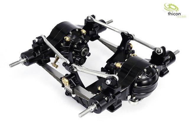 Two-axle black model truck frame with silver connecting rods and gears, photographed from above.