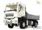 A white model lorry with a grey trailer. The vehicle has six wheels and is meticulously crafted.