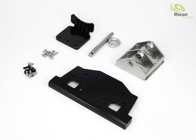 Metal parts and screws on a white background, arranged in different shapes and sizes, suitable for model-building projects.