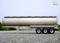 Silver tanker trailer on a gravel yard, green trees in the background. Thicon models logo in the top right corner.