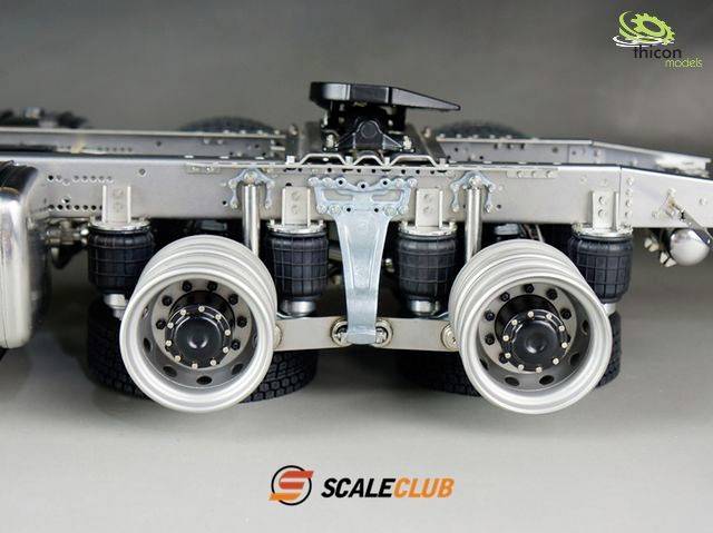 Close-up of a model lorry with detailed suspension and wheel mounting. Brand logos 'ScaleClub' and 'thicon models' at the top and bottom.