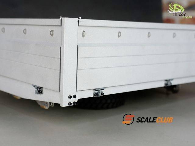 Close-up of a trailer with details such as hinges and fasteners. Logos of 'thicon' and 'SCALECLUB' visible.