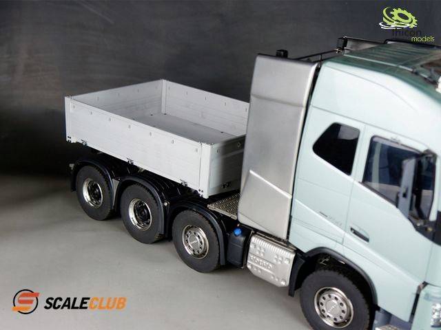 Side view of a model lorry with an open cargo bed. 'Scale Club' logo in the bottom left corner.