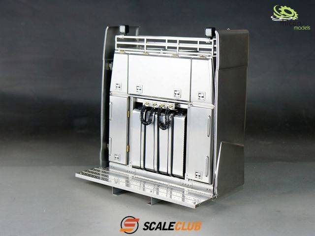 'ScaleClub' model of a truck refrigerator in silver, opened to reveal shelves and compartments, against a grey background.