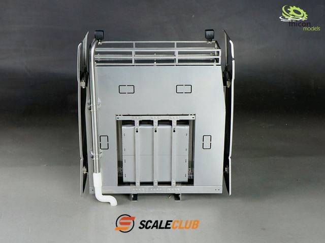 A model of an industrial lift with three vertical platforms, a side pipe network, and a dark background. 'Scale Club' and 'Trident Models' logos visible.