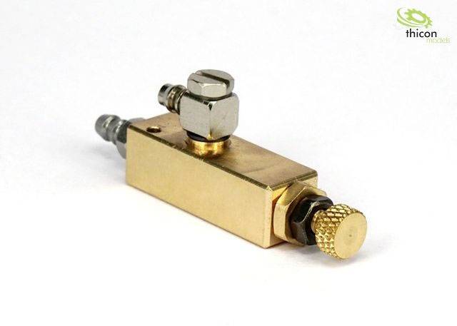 A small, rectangular brass component with screw and valve connections, used for technical or mechanical applications.