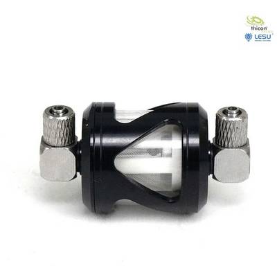 'Metallic inline fuel filter in cylindrical form, both ends with threaded connections, transparent housing reveals internal filter.'