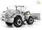 A silver-coloured, intricately detailed model loader with large black tyres stands sideways. The 'thicon models' logo is positioned in the top right corner.