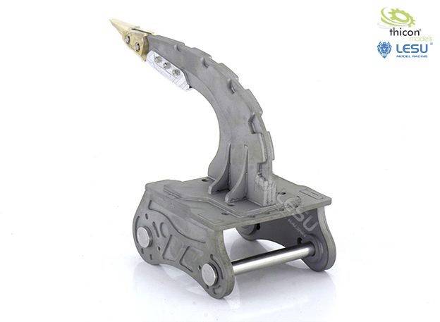 Mechanical gripper arm attachment with a curved joint and a claw-like tip, presented on a metal and plastic base.