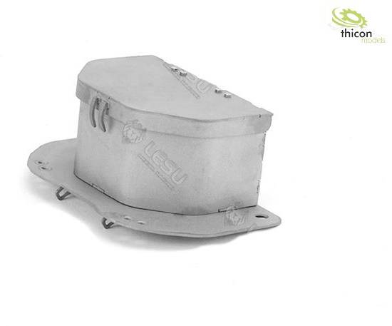 A metallic component with a rectangular shape and rounded edges, possibly part of a machine model.
