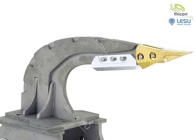 Metallic grey excavator grab arm with a golden tip on a white background. Company logos positioned top right.