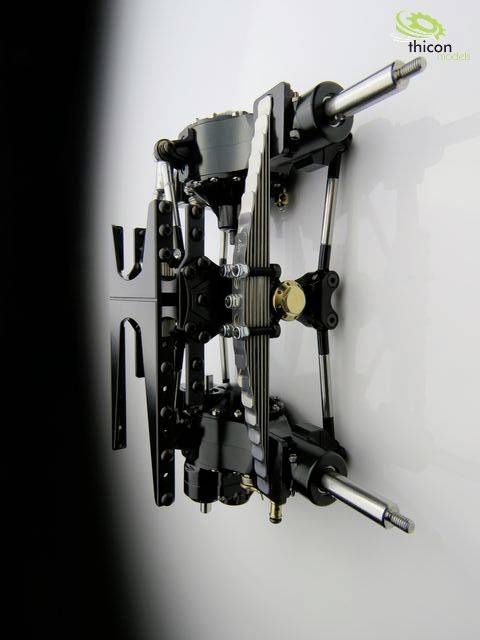 A mechanical axle system with various metal components, springs, and bolts. Suitable for model-making or technical demonstrations.