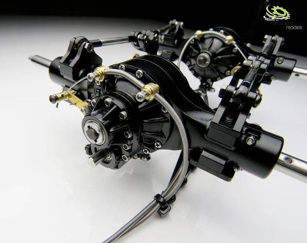 Close-up of a complex machine part with pipes and screws, on a white background. Focus on mechanical details.