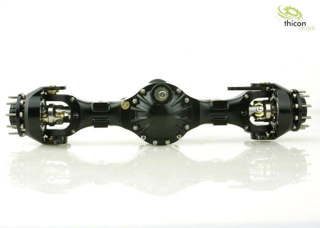 Black, mounted axle with details such as screws and connections, reflecting on a glossy surface.