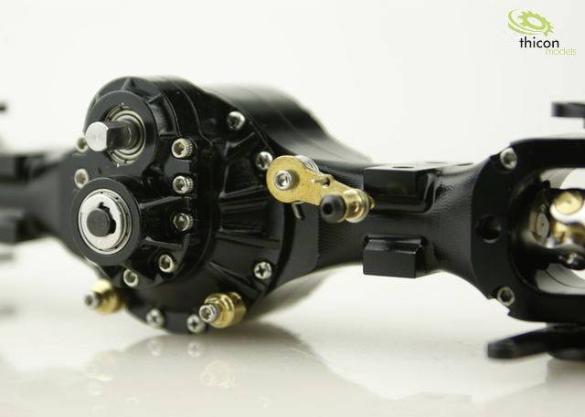 Close-up of a precise mechanical component with multiple screws, gears and a metal casing, mounted on an axle.