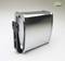 Metallic product enclosure with rounded edges and a black mounting bracket, against a light background.