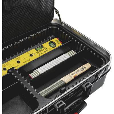 An opened toolbox contains a spirit level, ruler and various small tools.