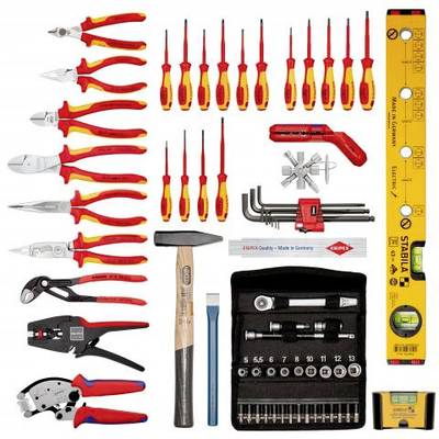 A set of hand tools on a white background. Includes screwdrivers, pliers, hammer, ruler, socket spanners and more.
