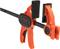 An orange quick-release clamp with a black handle and jaws, showing 'JORGENSEN E-Z HOLD' on the side.