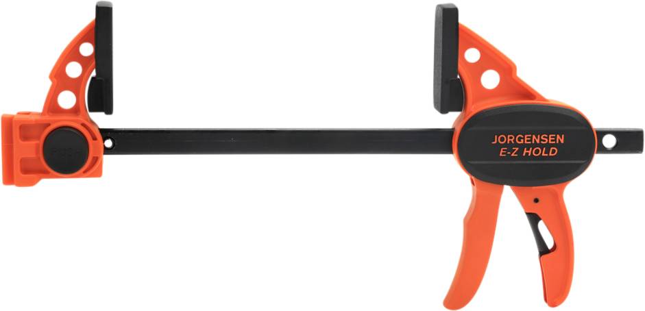 An orange and black 'Jorgensen E-Z Hold' clamp, used for holding and securing workpieces during work or repairs.
