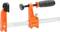 The image depicts an orange G-clamp with a black handle, suitable for securing workpieces during machining.