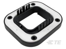 Square black seal with inner frame and four holes at the corners.