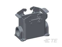 Grey technical component, likely a housing part or mounting bracket, with multiple holes and attachment points, shown in perspective view.