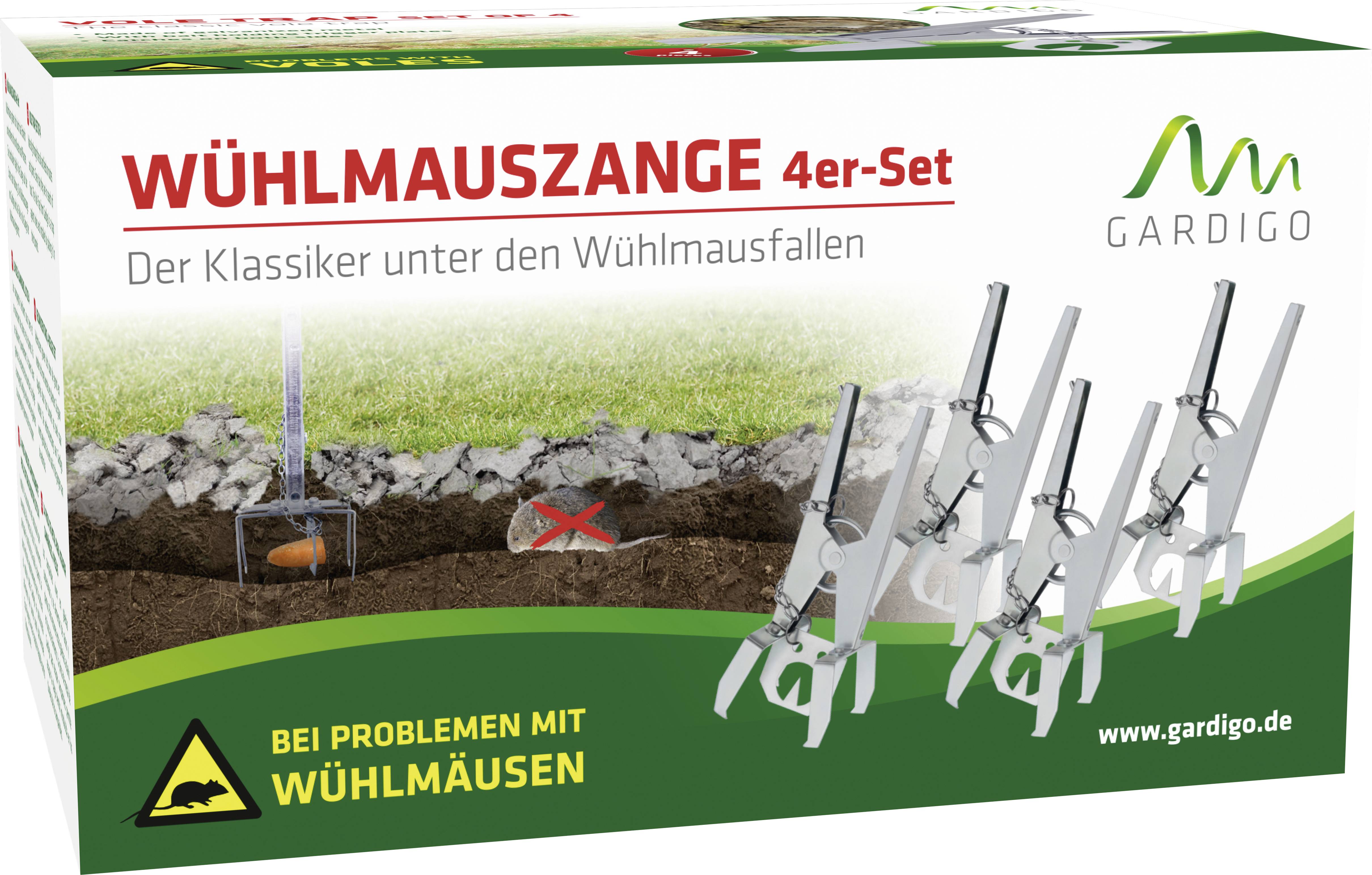 'Mole Trap Pliers 4-Pack' in a cardboard box. Labelling: 'The classic among mole traps'. Image shows pliers in front of a mole tunnel.