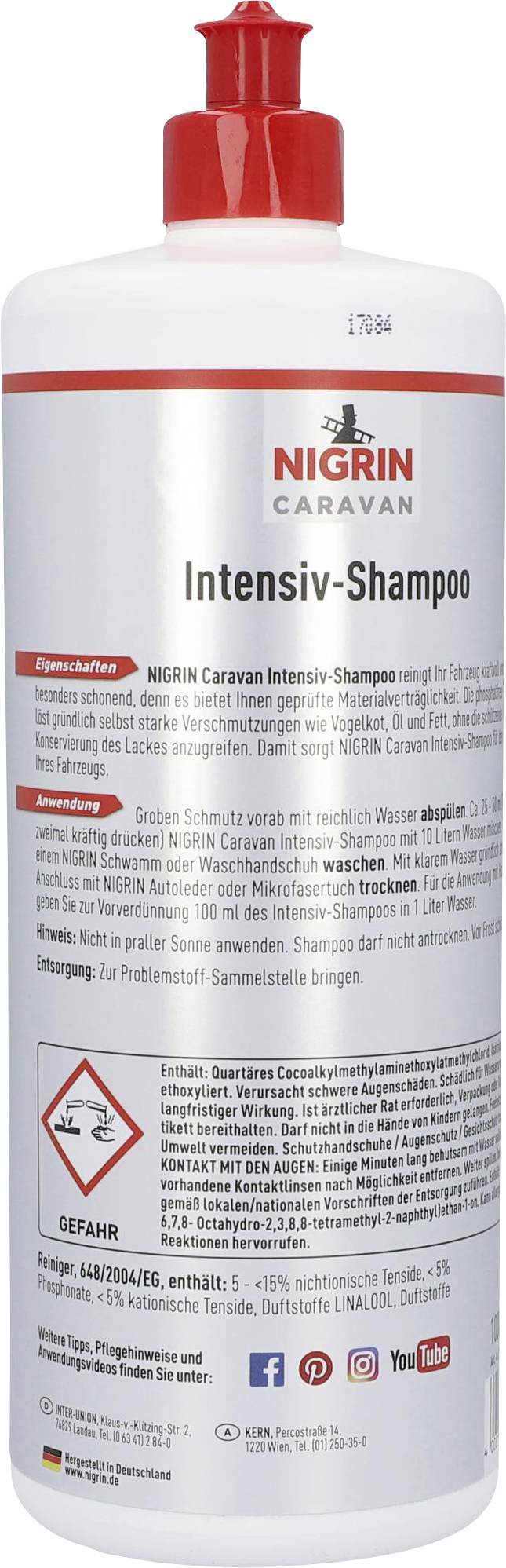 Bottle of NIGRIN Caravan Intensive Shampoo with red cap, 1 litre. Cleans and protects caravan surfaces.