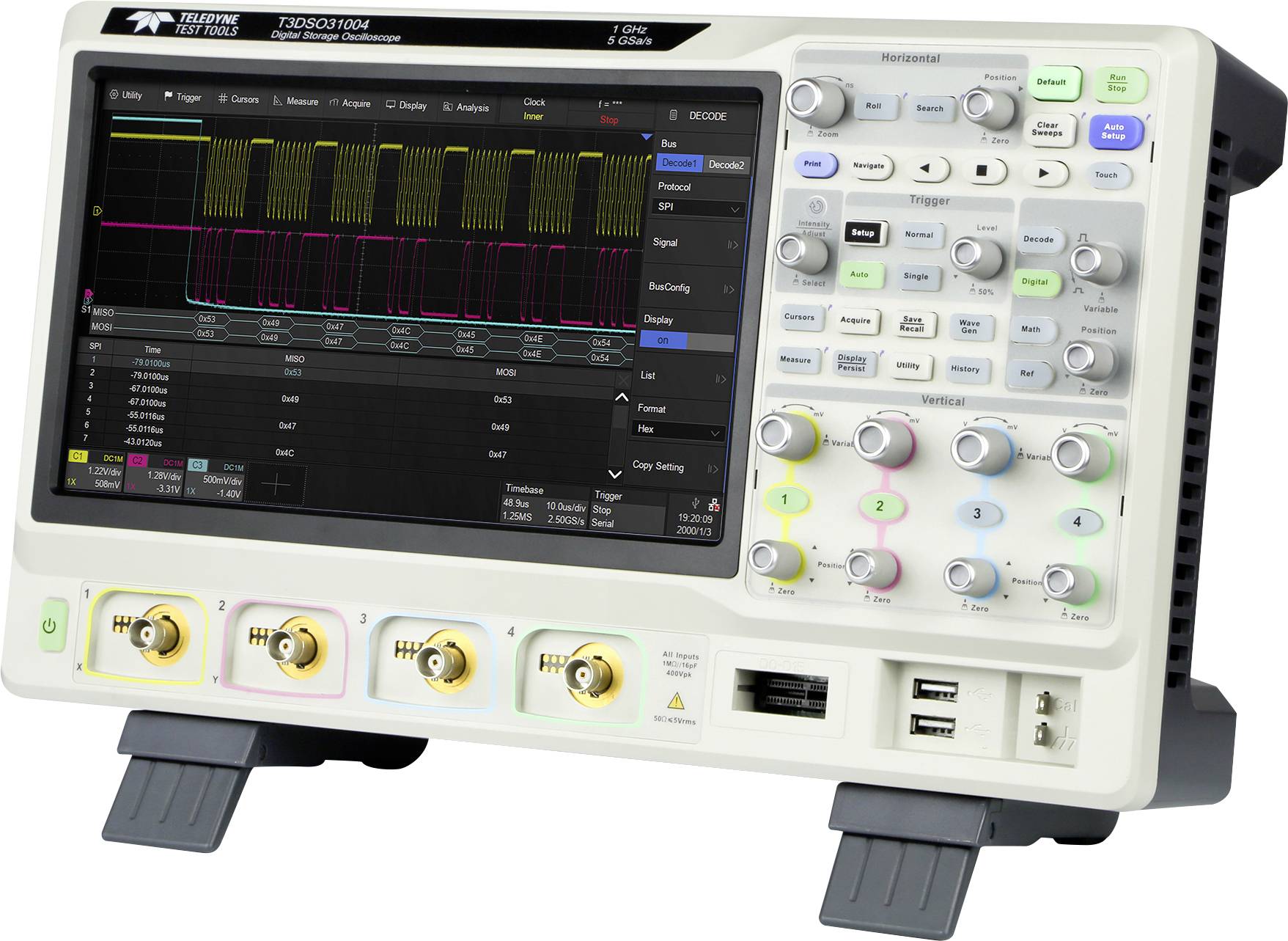 A digital oscilloscope displays various waveforms on the screen with multiple rotary controls and sockets underneath.
