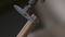 A machine tool cuts a copper pipe. A close-up shows the cutting process with a rotating blade.