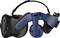VR headset in black and blue with 'Vive' printed on it. It has integrated headphones and an adjustable head strap.