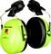 Ear defenders in luminous green with black inner lining and adjustable headband, suitable for noisy environments.