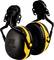 Ear defenders in black and yellow, 3M Peltor model, with padded ear cups and adjustable headband.