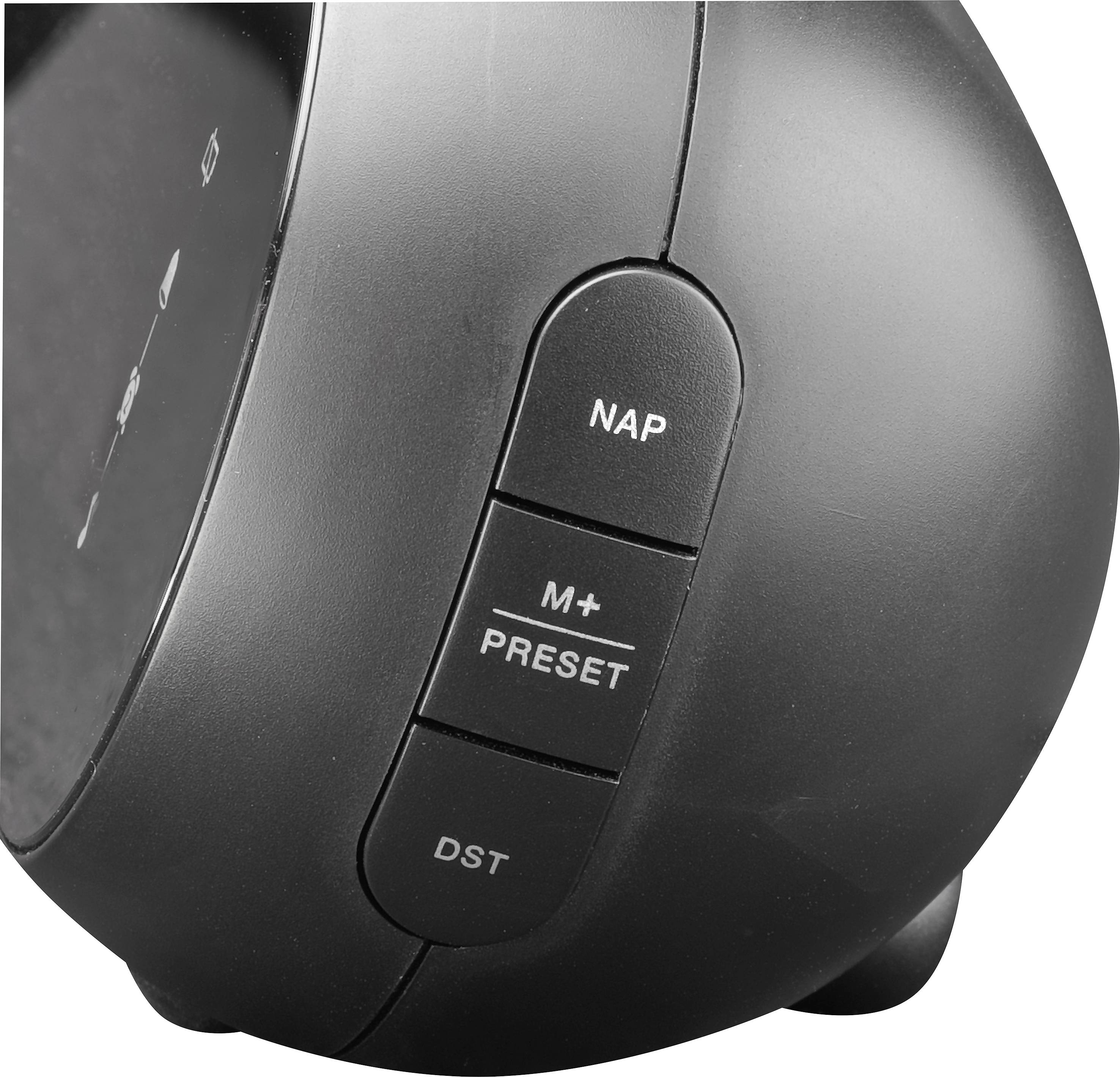 Black radio alarm clock with three buttons: 'NAP', 'M+ PRESET', 'DST'. Buttons are for preset functions and time settings.