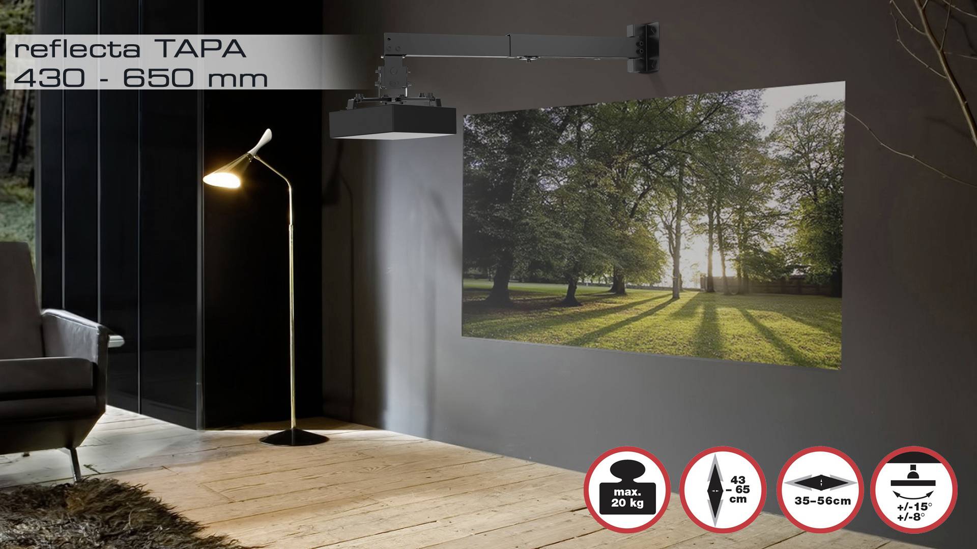 'Reflector TAPA 430 - 650 mm' with projector arm and screen, max. 20 kg load. Standing lamp and sofa in the room. Landscape picture shows trees in sunlight.